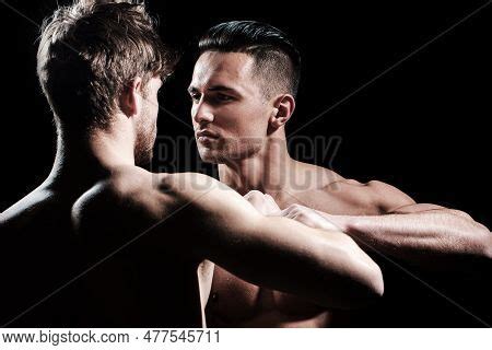 men fighting nude