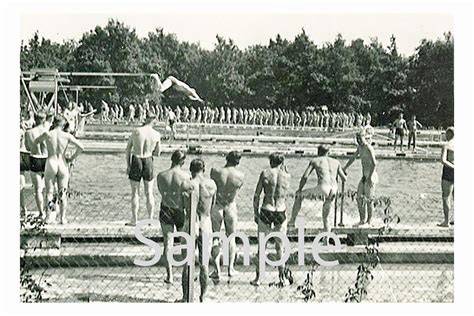 men swim nude