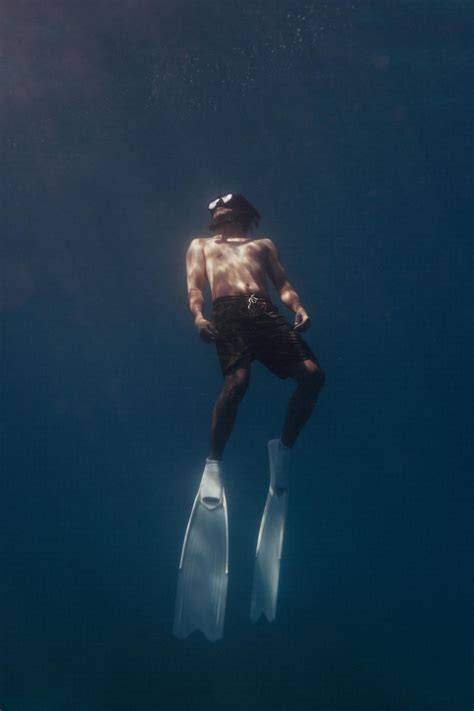 men swimming nude
