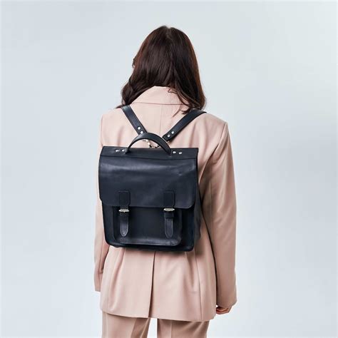 Messenger Backpack Women's