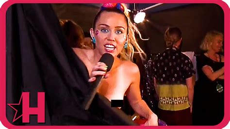 Miley Cyrus' nip slip and underarm hair in double wardrobe malfunction in  NYC