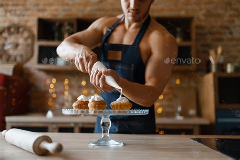 Naked man in apron