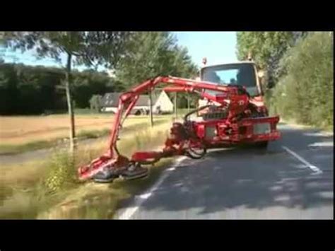 new technology to cut grass on Road side - YouTube