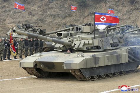 North Koreau0027s Kim U0027drivesu0027 New Tank During Mock Intro To Division - Intro To Division
