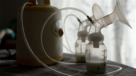 nude breast pumping