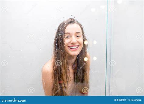 Nude brunette shower