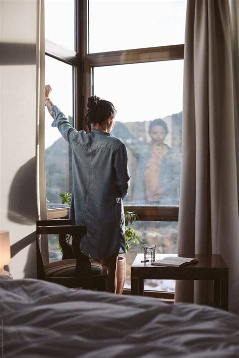 nude in hotel window