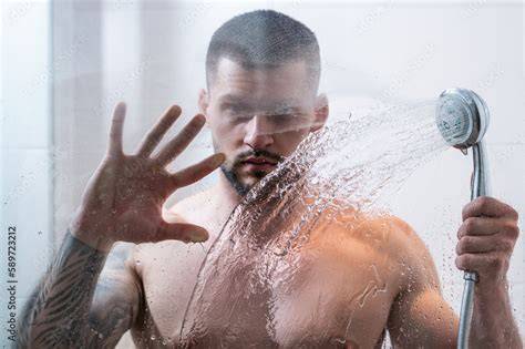 nude man in shower