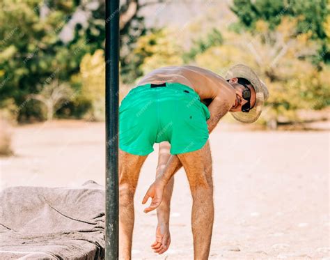 nude men bent over