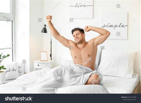 nude men in bed