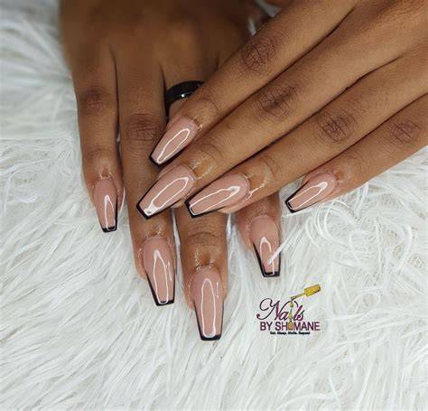 nude nails with black designs