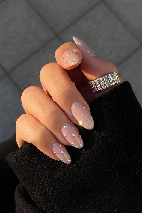 nude rhinestone nails