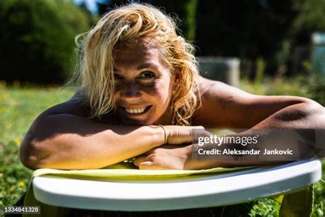 nude sunbathing in the backyard