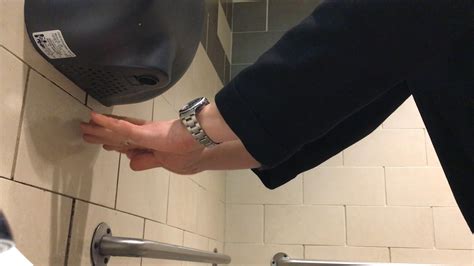Peeing in hand dryer
