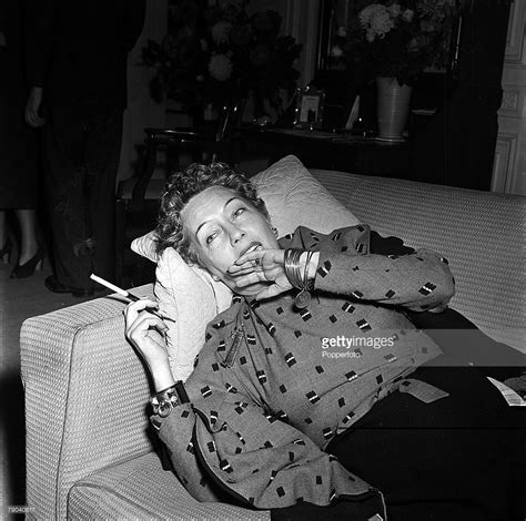 pictures of gloria swanson smoking cigarettes