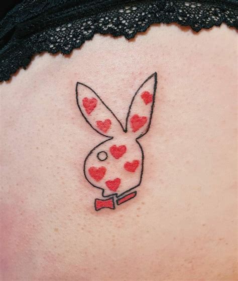 Playboy bunny tattoo on butt
