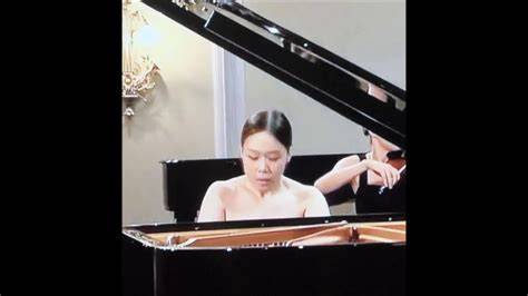 playing the piano nude