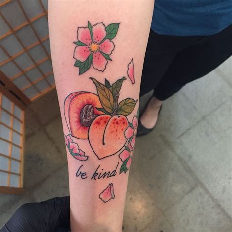 pretty peach tattoo on the arm Peach tattoo, Tattoos, Aesthetic tattoo