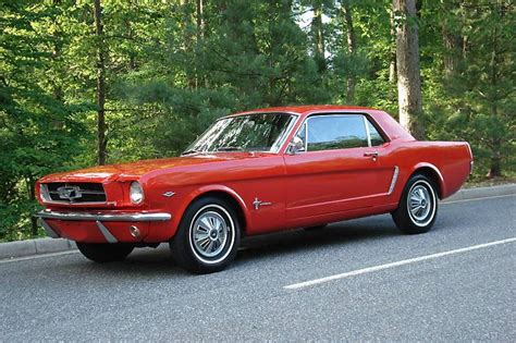 Blaze Through Time: The Enchanting Red 1965 Ford Mustang