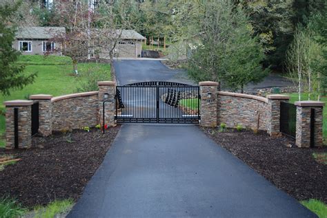 Rock Fencing Gate Driveway Image