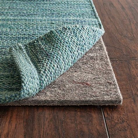 rugs with rubber or polyester on vinyl if rug pad is the right