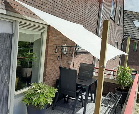 schaduwdoek op balkon