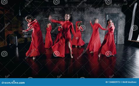 seven charming dancers women are dancing in rehearsing hall