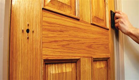 should i stain or varnish exterior door?