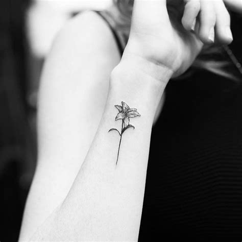 Small Lily Wrist Tattoos