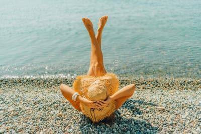 spread legs nude beach