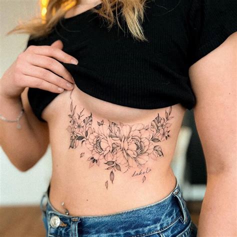 sternum tattoo large breasts