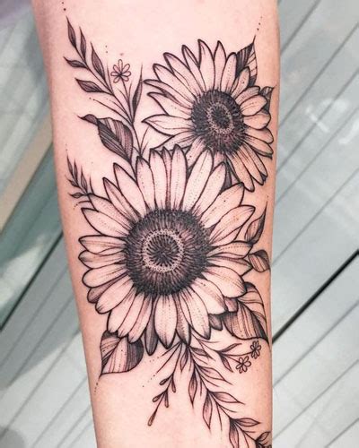 Sunflower nipple tattoo