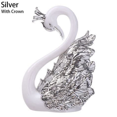 svan prydnad guld silver