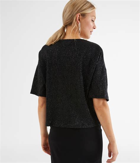 svart glittrig topp