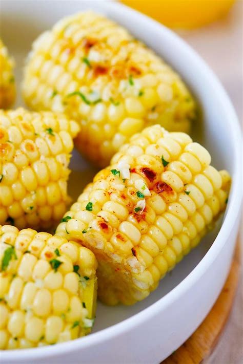 sweet corn, garlic & tomato soup with avocado and dill