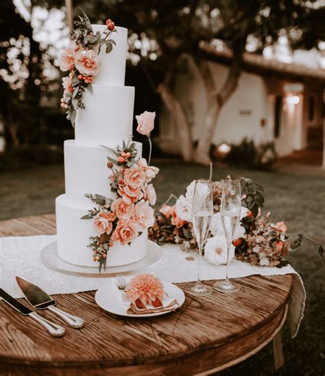 Table With Flowers Wedding Cakes