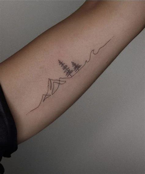 tatuering hund och berg