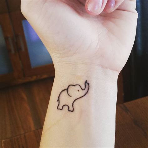 The Best Small Elephant Tattoo With Flowers Ideas Small Elephant Tattoo With Flowers - Small Elephant Tattoo With Flowers