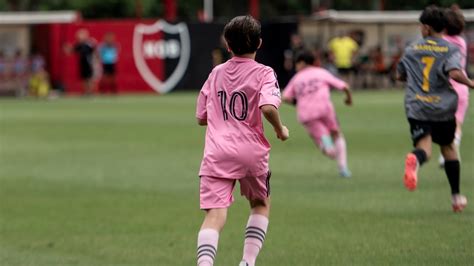 thiago messi playing soccer