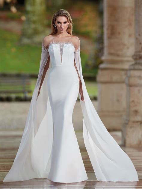 Vestidos de novia con capa: Un toque de elegancia y sofisticación