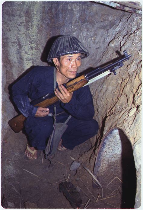 vietnamese guy with gun