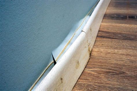 water leaking from baseboard after rain