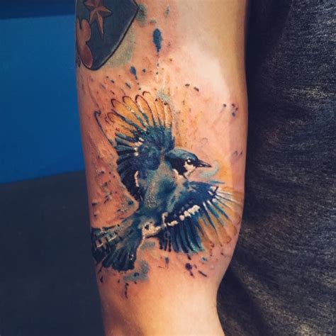 Watercolor blue jay tattoo