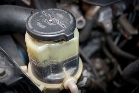 when should you replace power steering fluid