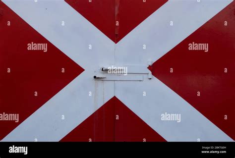 White Flag Red Diagonal Cross