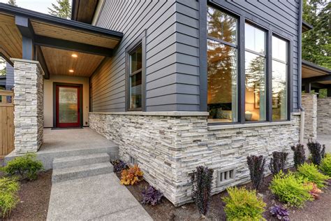 who does exterior stone installation for houses?