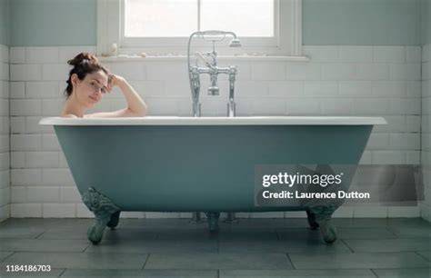 women bathing nude