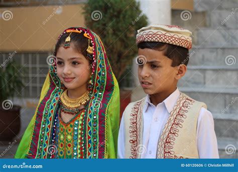 young pakistani  girl and boy on date in park